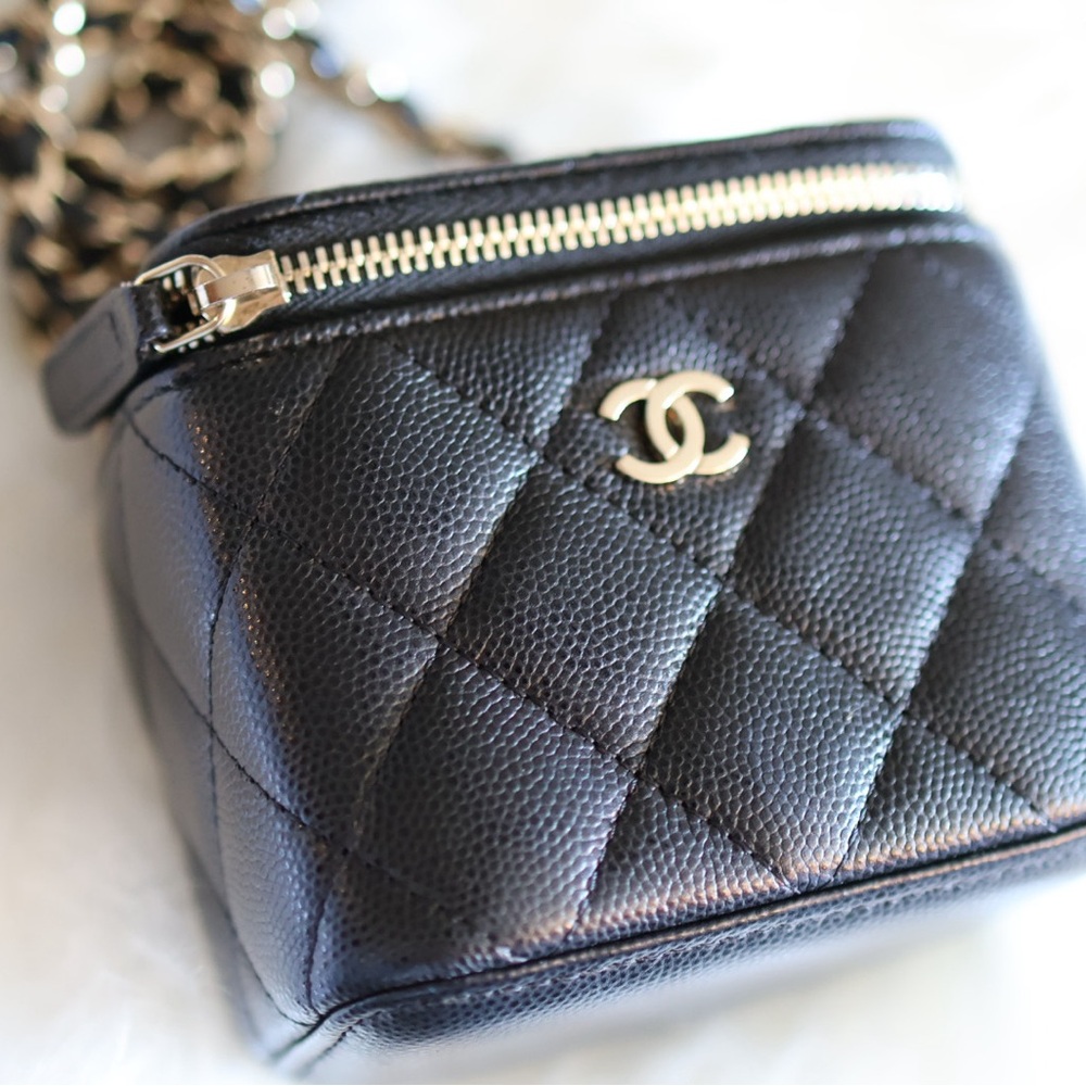 Chanel Black Quilted Mini Bag with Gold Accents